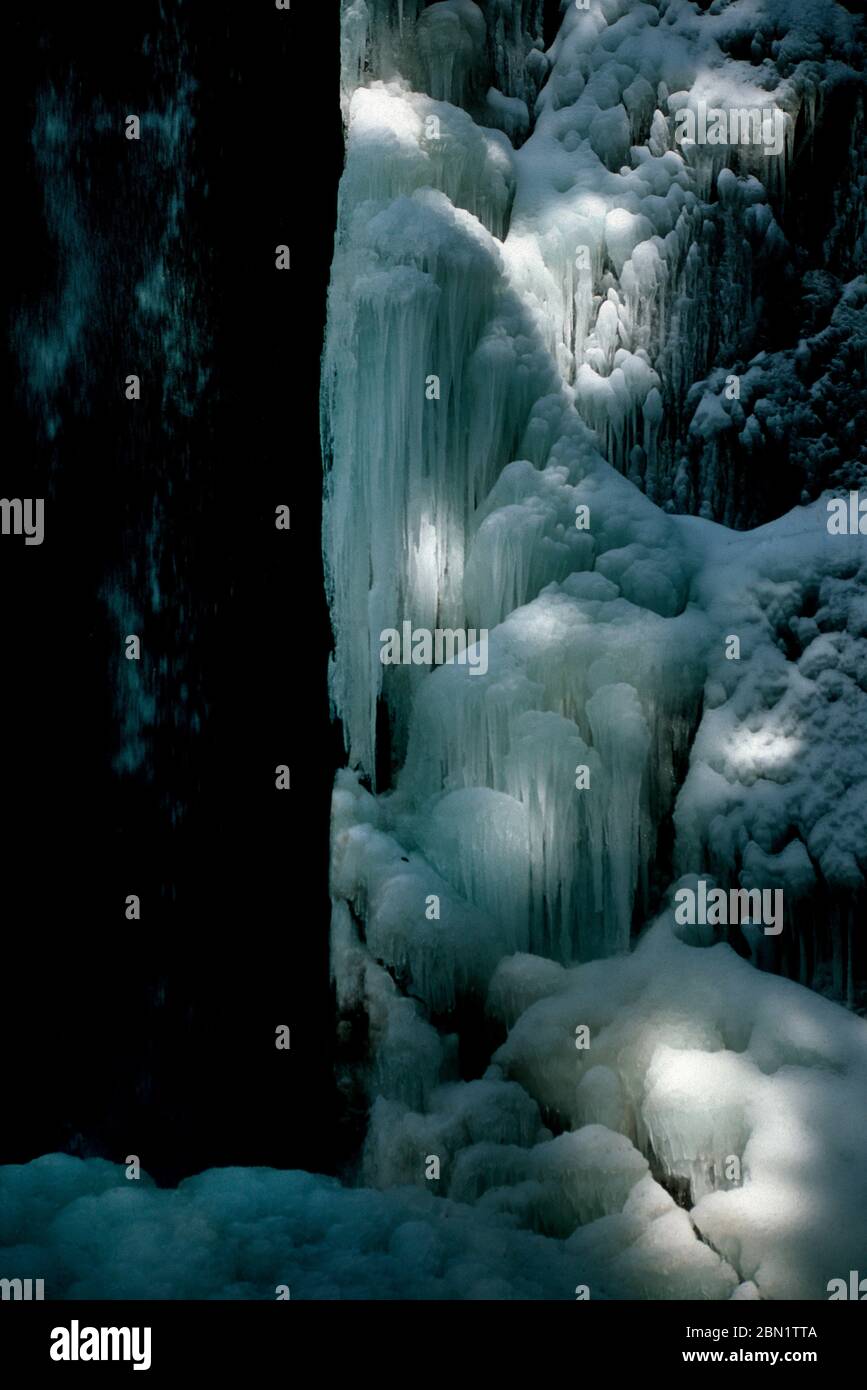 Vertical shot of Ice waterfall in Auvergne-Rhone-Alpes, France Stock Photo