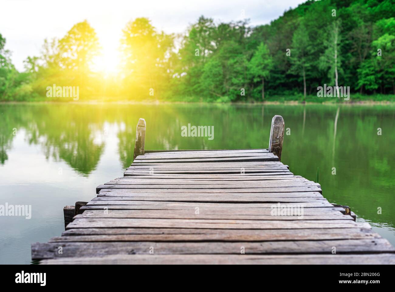 Wooden pier on the lake Stock Photo - Alamy