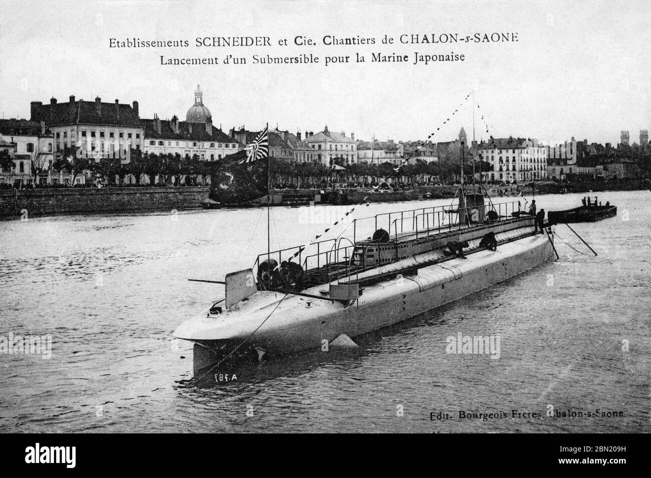 [ 1910s France - Japanese Submarine ] —   A submarine constructed for the Imperial Japanese Navy by the French steel-making, armaments and locomotive manufacturer Schneider & Cie just after being launched at the company’s dockyards in Chalon-sur-Saône in eastern France.  Photography by Bourgeois Frêres.  Original text: Lancement d'un Submersible pour la Marine Japonaise  20th century vintage postcard. Stock Photo
