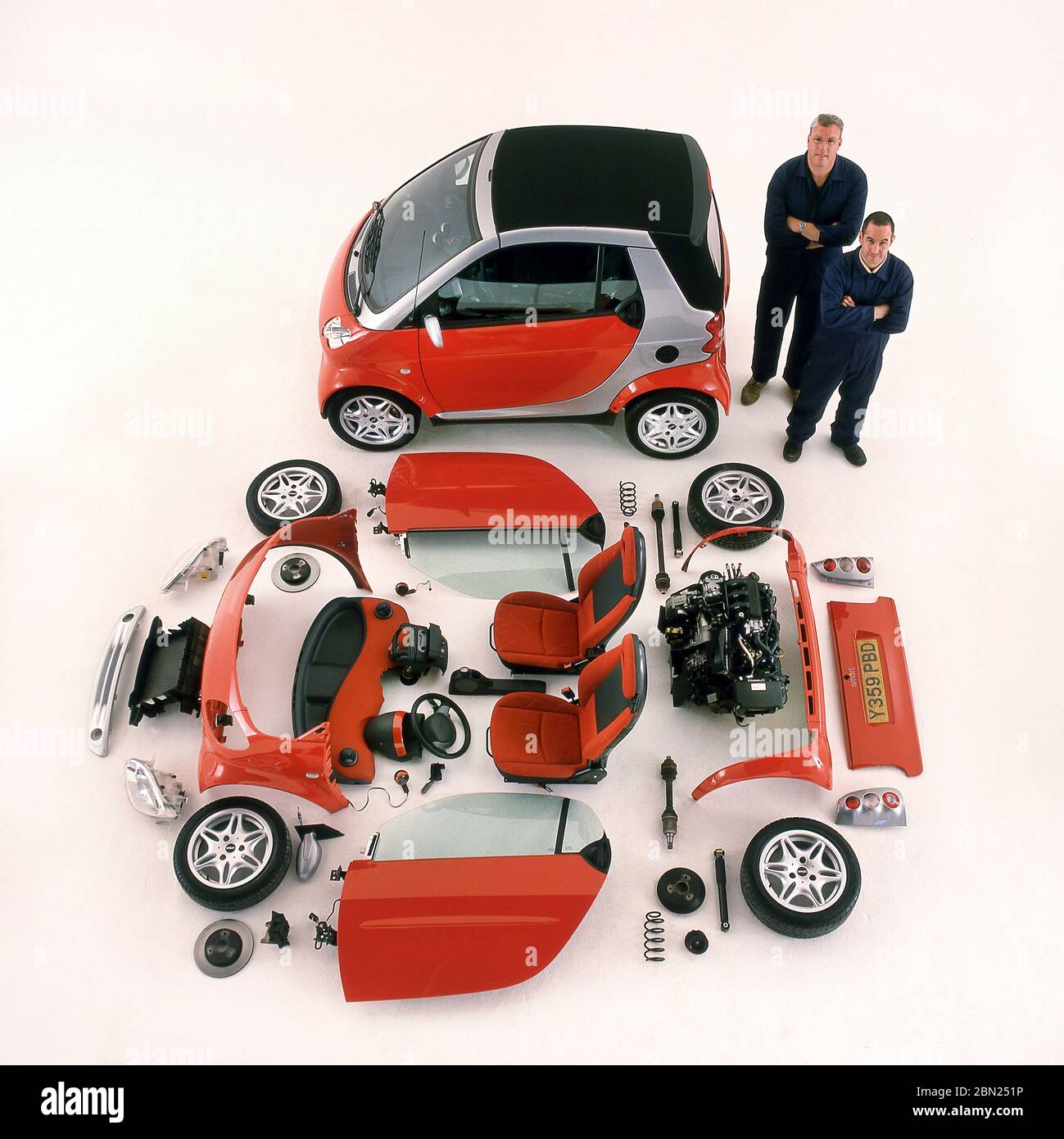 2001 Smart Two car and components that make up the car laid out on display  Stock Photo - Alamy