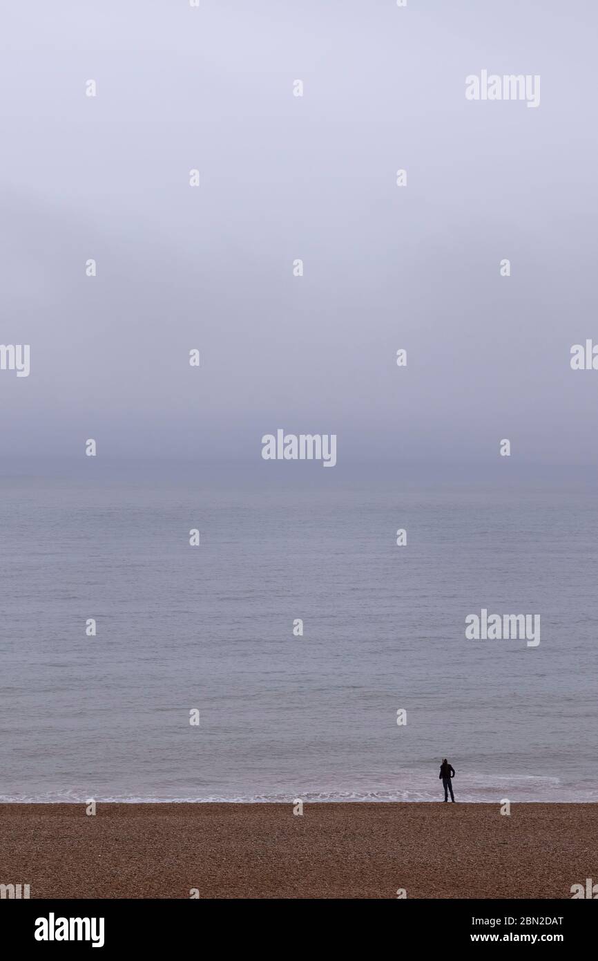 alone on a beach isolating Stock Photo