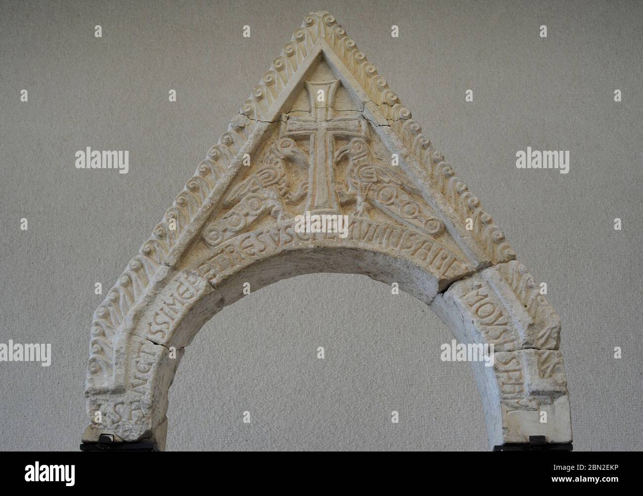 A gable of an altar screen. Detail. The inscription reads: 'Most Holy Peter, accept this gift from the honourable Moses, your holy servant, 11th century. From Suplja crkva Solin, coronation site of king Zvonimir. Museum of Croatian Archaeological Monuments, Split, Croatia. Stock Photo