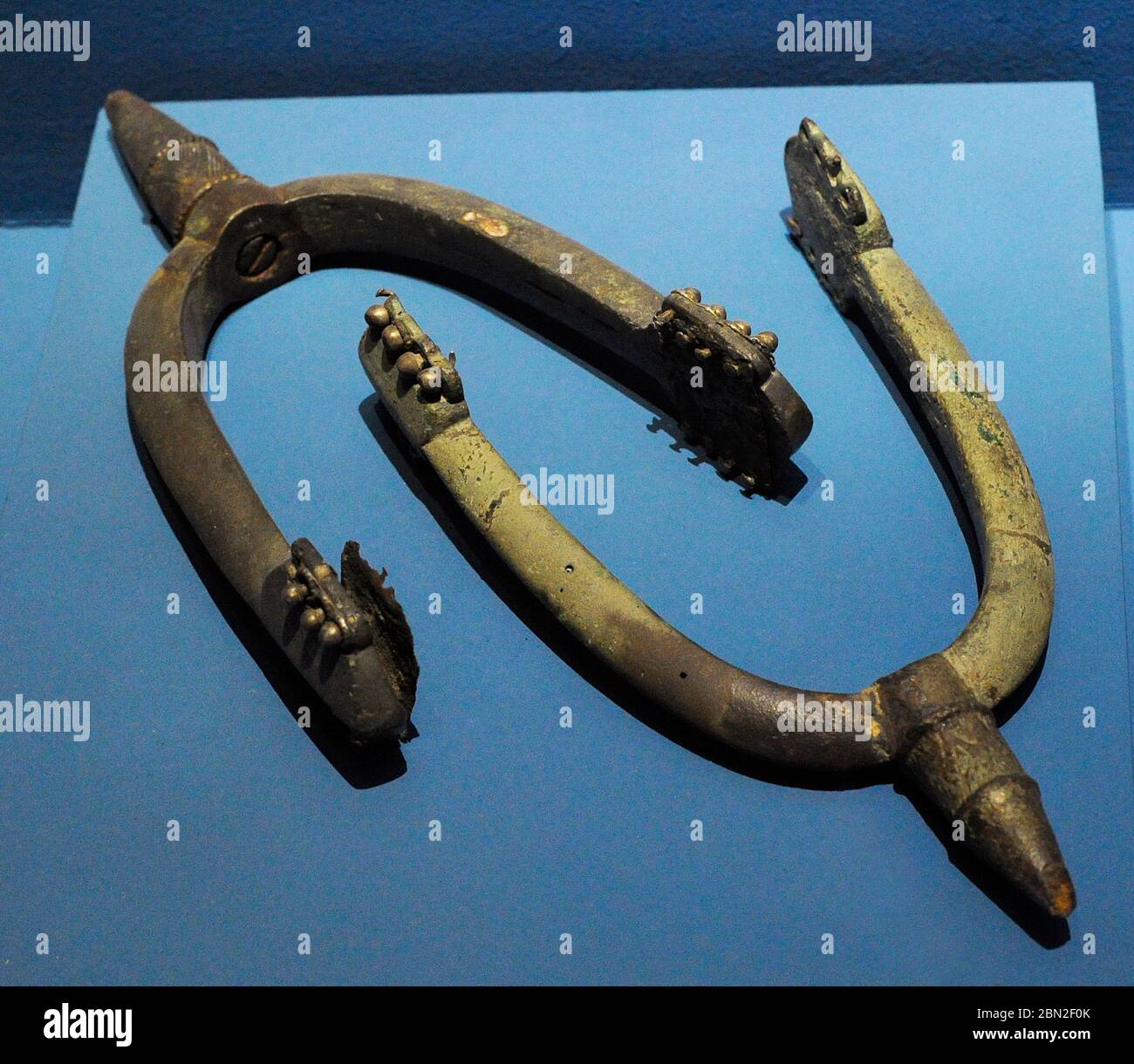 Massive bronze spurs of Carolingian Provenance. Gornji Koljani-Crkvina. Croatia. Museum of Croatian Archaeological Monuments, Split, Croatia. Stock Photo