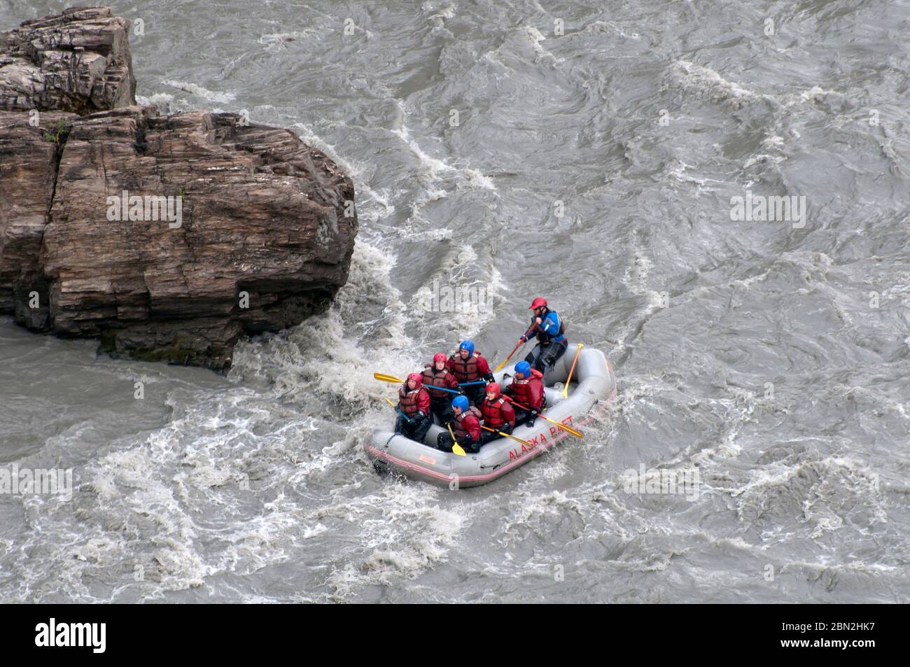 people white water rafting in Alaska Stock Photo