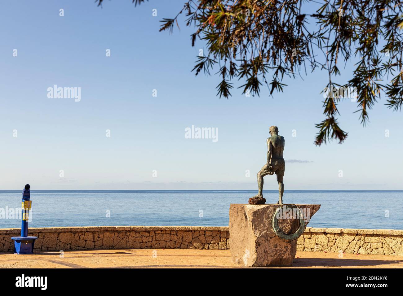 Statue of Javier Perez Ramos at the viewpoint overlooking Playa del Duque  beach, Costa Adeje, Tenerife, Canary Islands, Spain Stock Photo - Alamy
