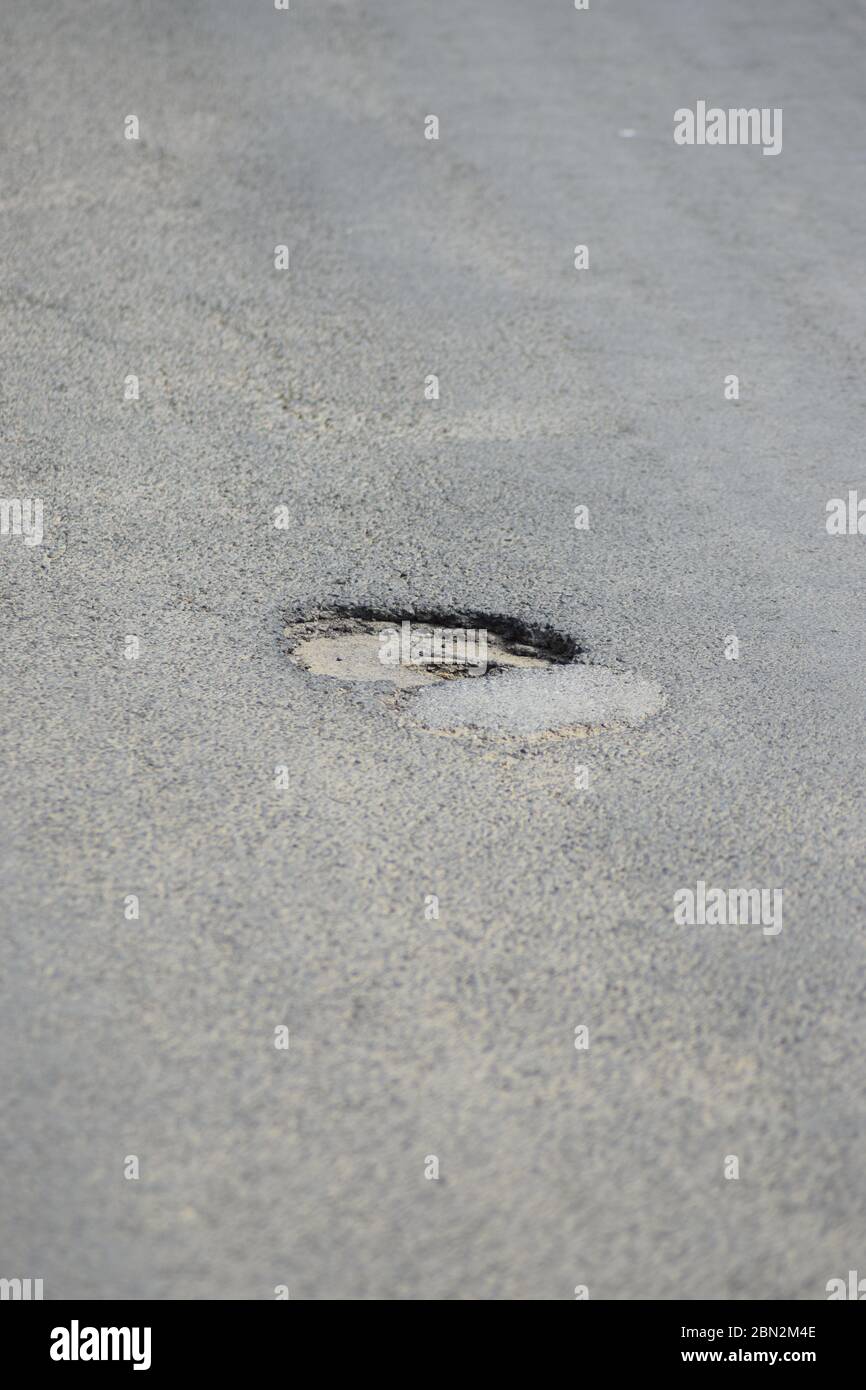 badly damaged road in Germany Stock Photo