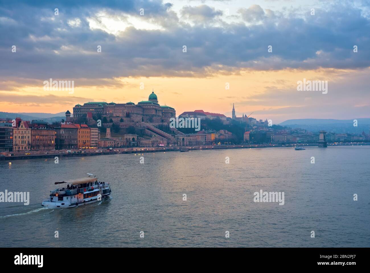 Danube river and a boat against Royal Palace of Buda in Budapest at ...