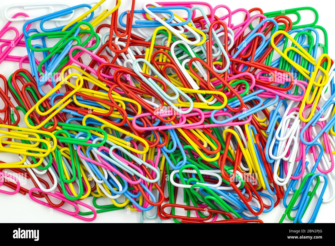 Collection of colorful Paper clips on white background Stock Photo - Alamy