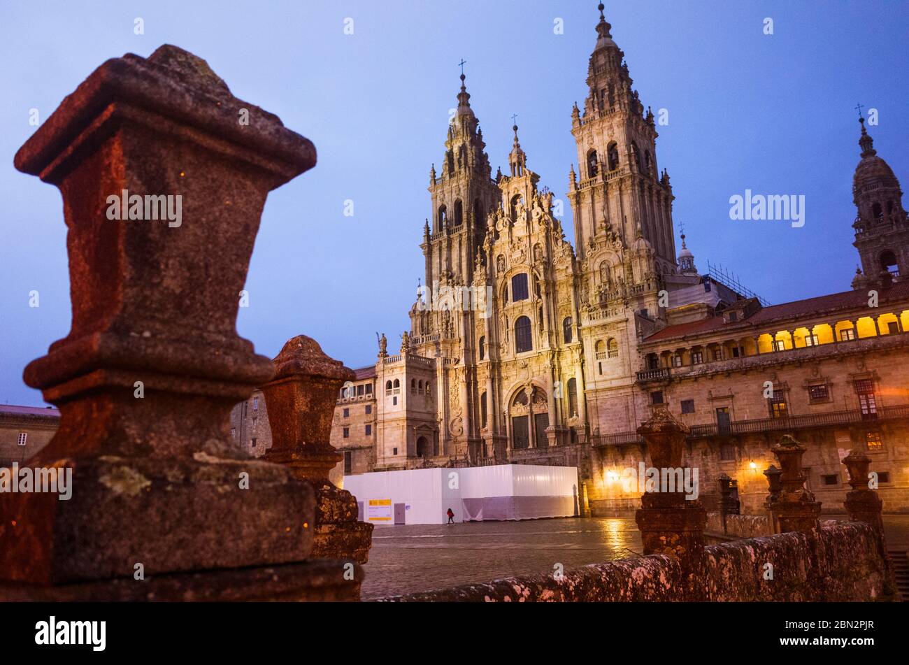 Santiago de Compostela, A Coruña province, Galicia, Spain - February 12th, 2020 : Illuminated Baroque facade of the cathedral in the Obradoiro square. Stock Photo