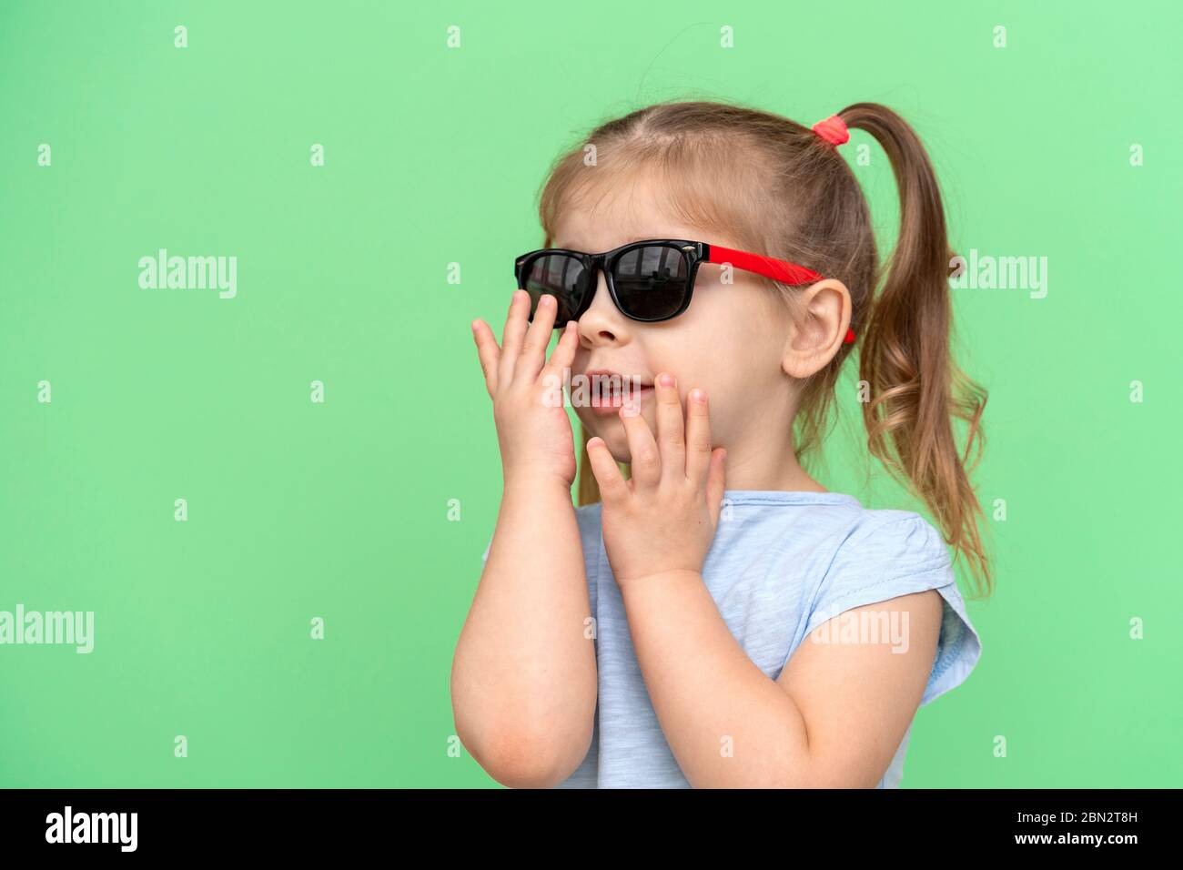 puts on sunglasses