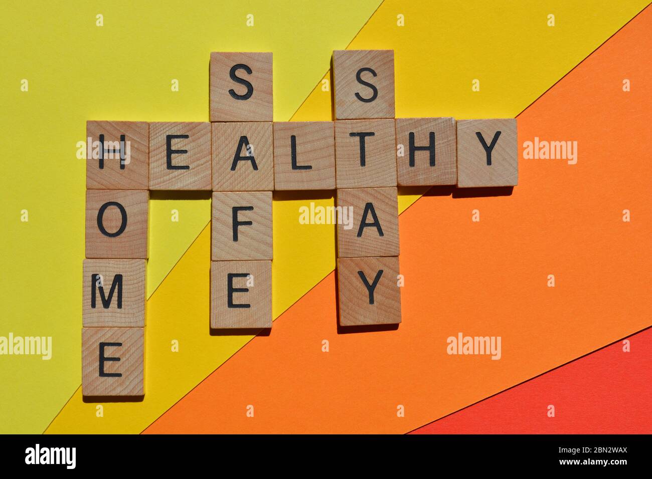 Stay, Safe, Home, Healthy, crossword isolated on colourful background Stock Photo