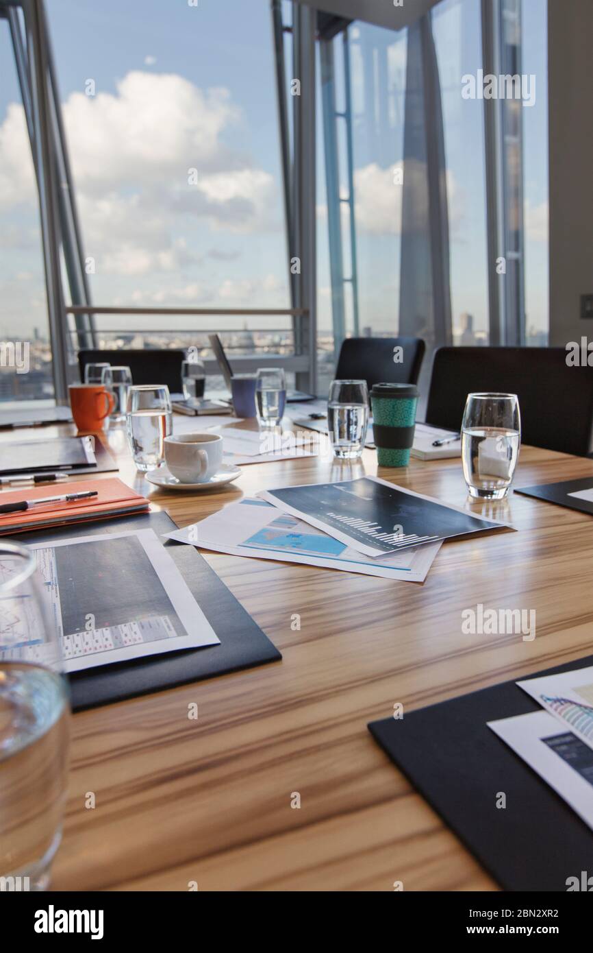 Paperwork on conference room table Stock Photo