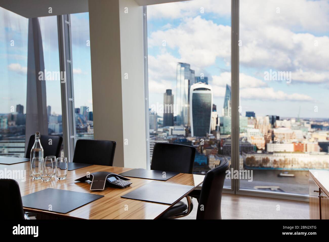 Image showcasing Modern conference room overlooking highrise buildings and city Stock ...