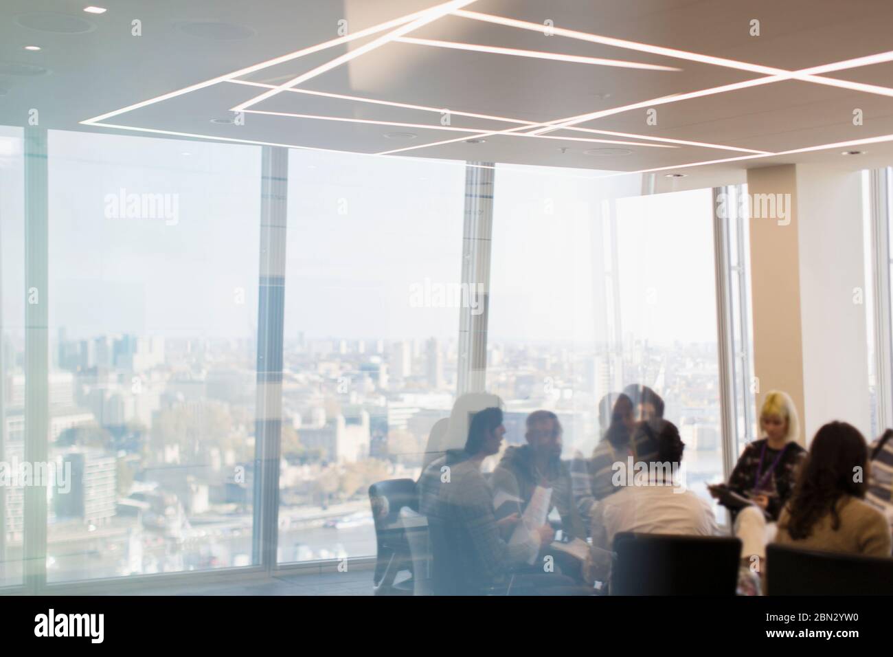 Business people in urban conference room meeting Stock Photo