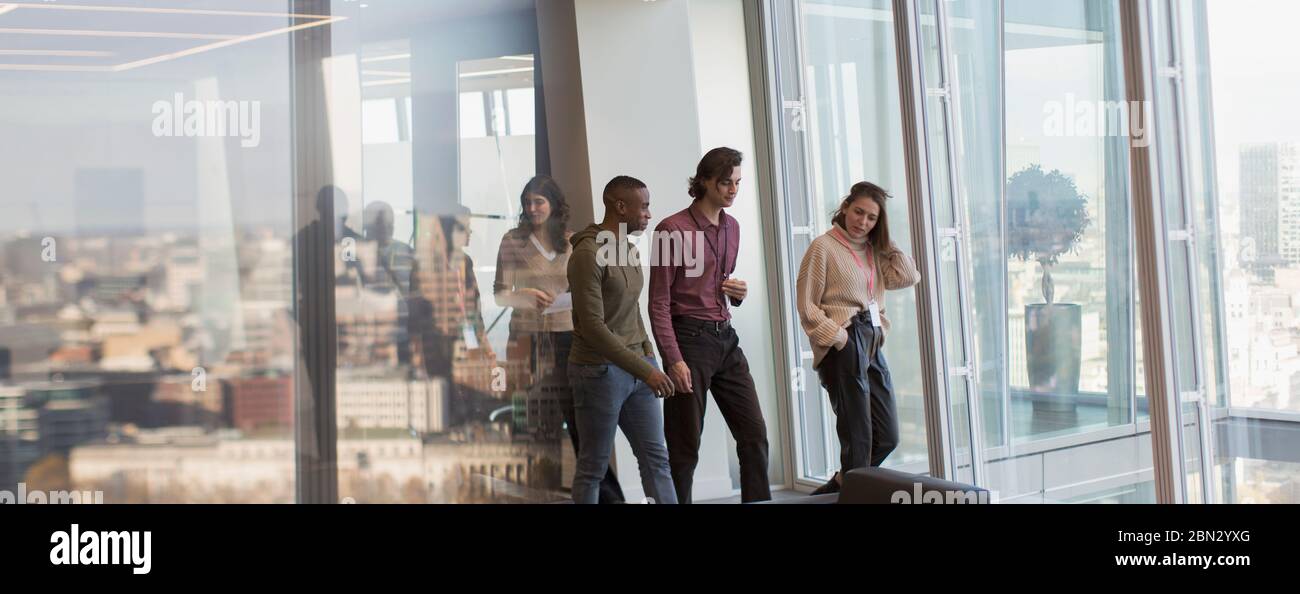 Business people walking in urban office Stock Photo - Alamy