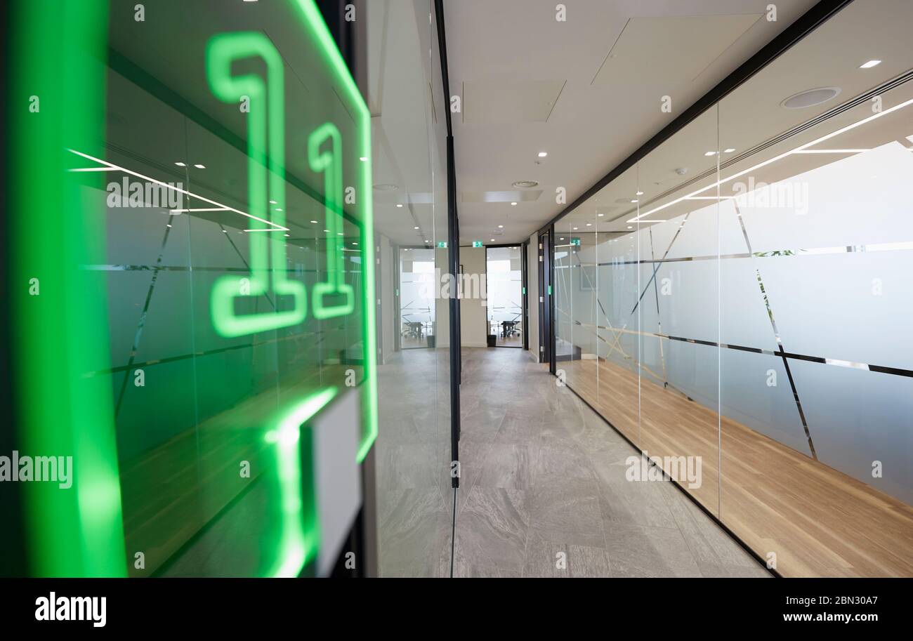 Neon sign in modern business office corridor Stock Photo