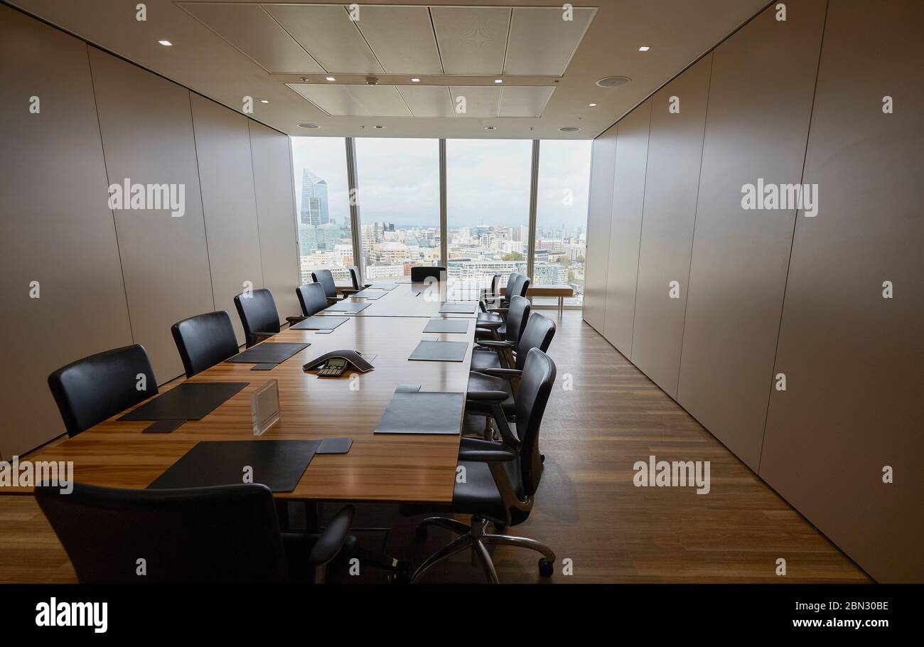 Long wood conference room table Stock Photo