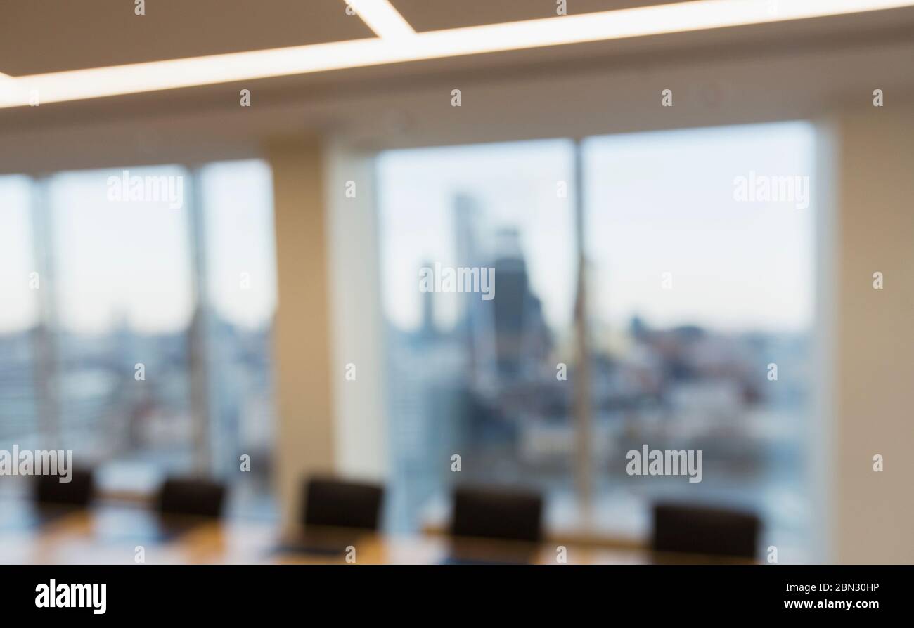 Conference room overlooking city Stock Photo