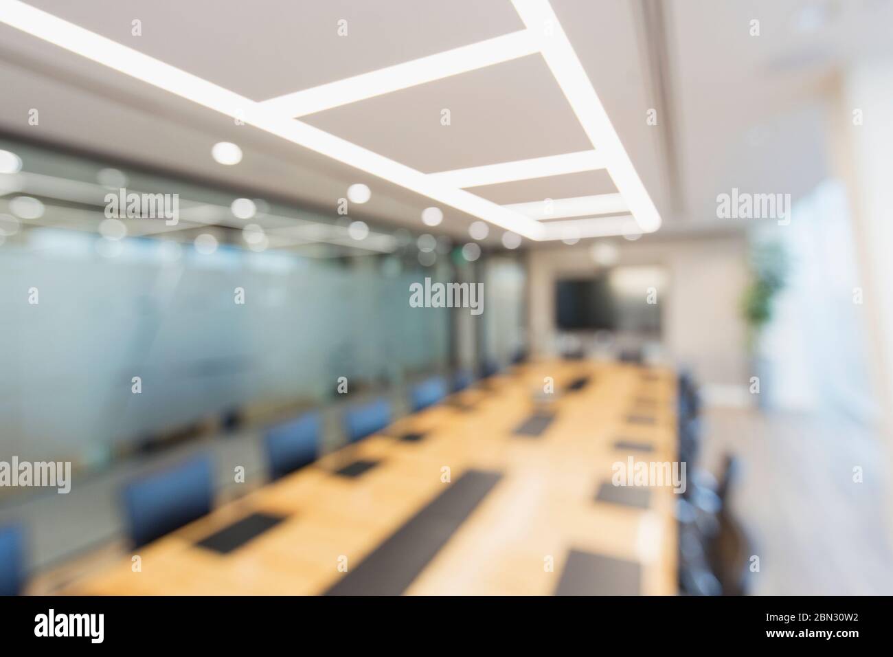 Long table in modern business conference room Stock Photo