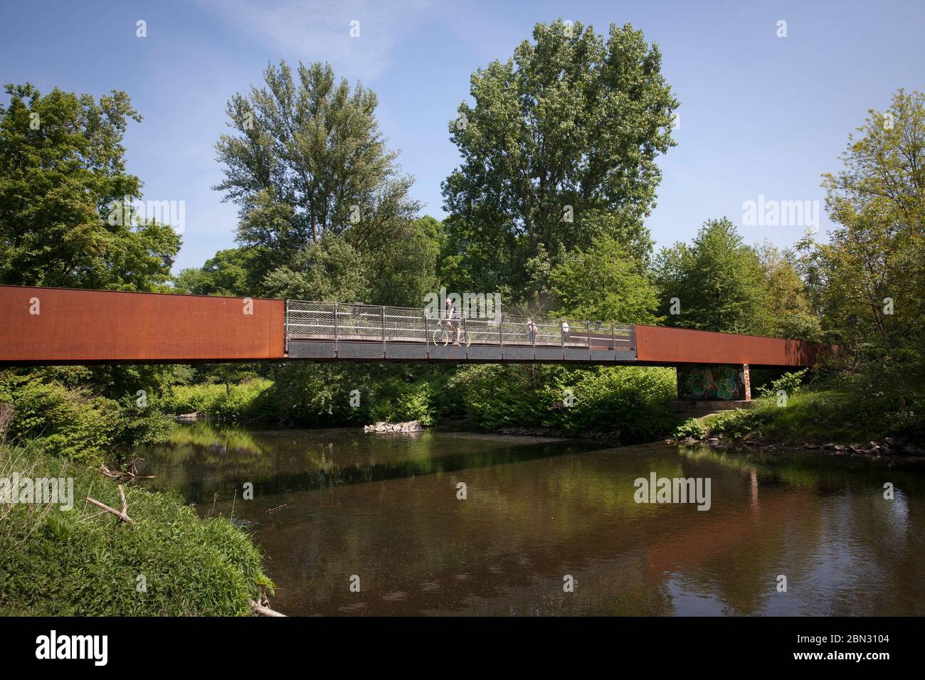 bridge over the river Wupper in the Ludwig-Rehbock park in the district of Opladen, Leverkusen, North Rhine-Westphalia, Germany.   Bruecke ueber die W Stock Photo