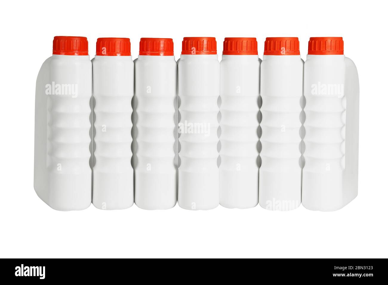 Row of Plastic Containers for Engine Lubricants on White Background Stock Photo