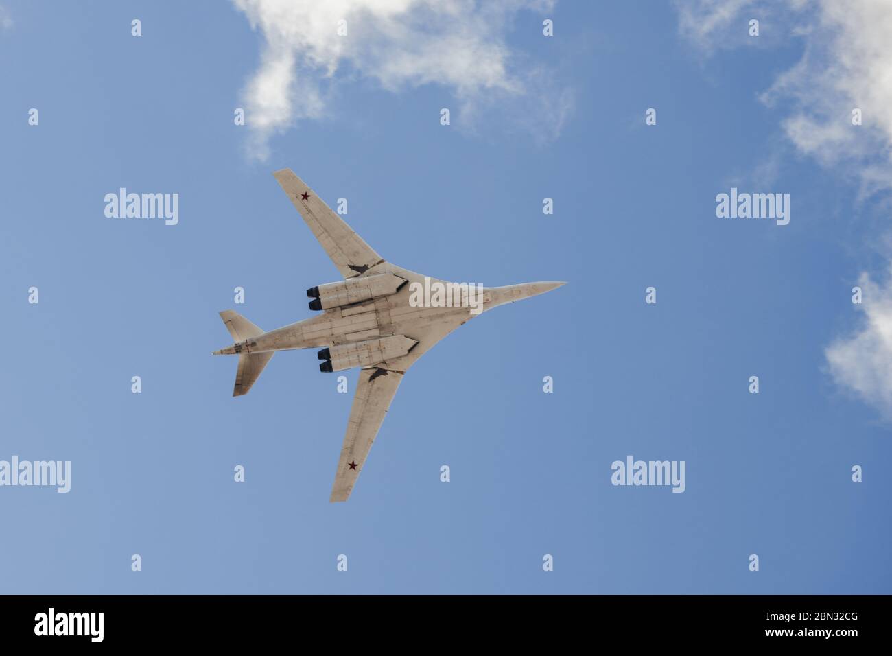 Russian aircraft Tu-160 (White Swan) for strategic bombing in the air against a clear sky Stock Photo