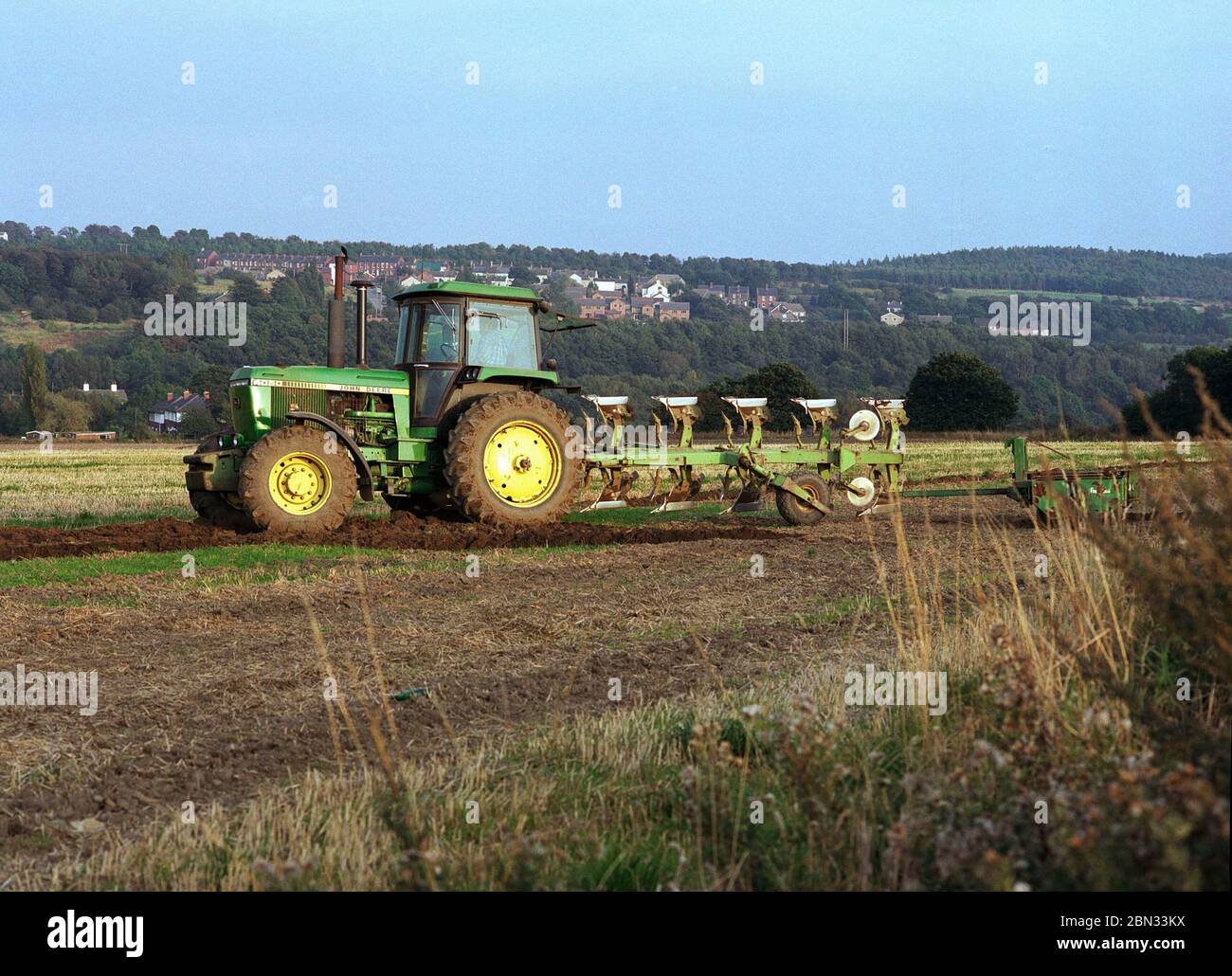 Tractor at work ploughing at Wakefield, West Yorkshire, Northern England, in 1997 Stock Photo