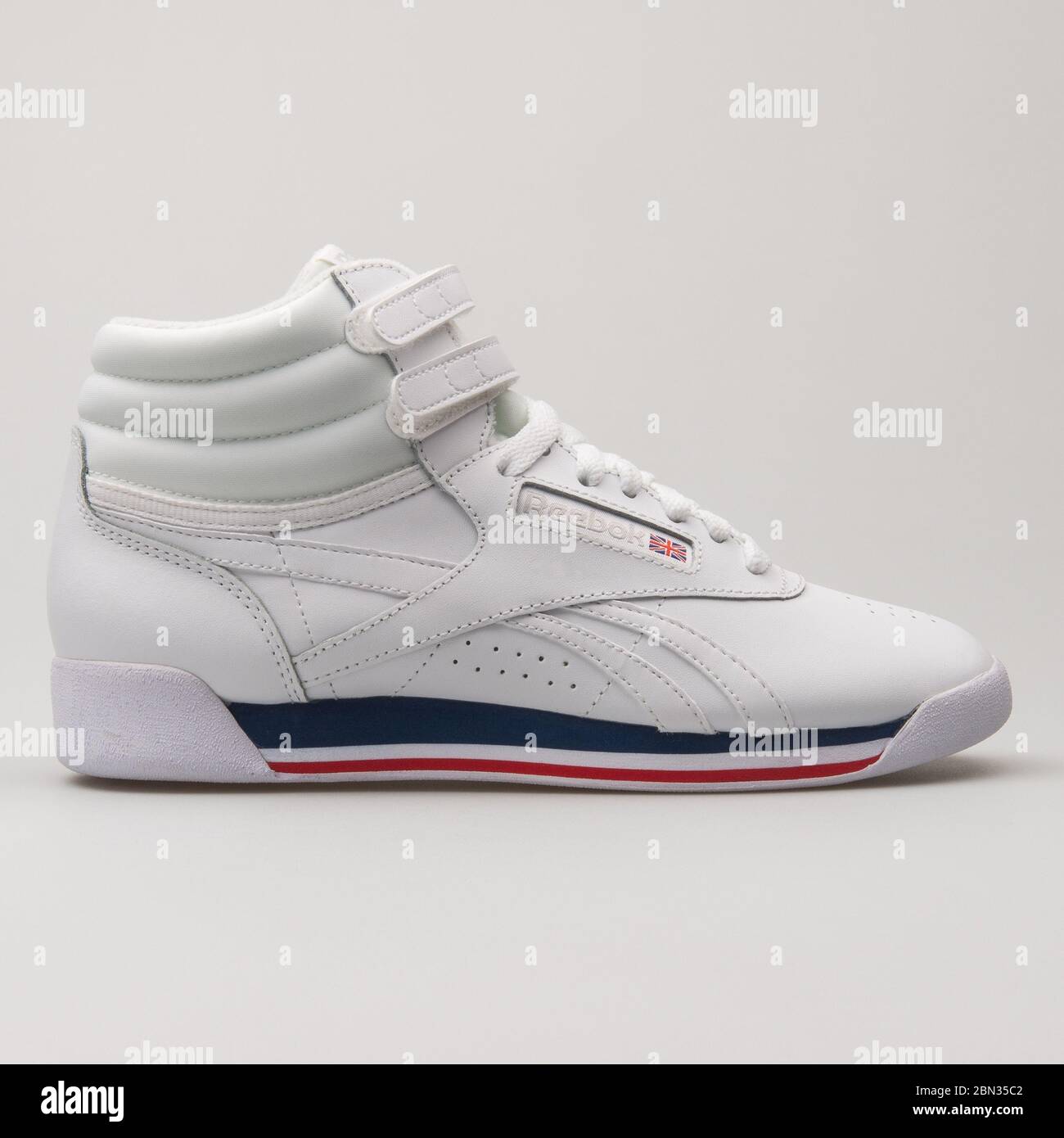 VIENNA, AUSTRIA - AUGUST 13, 2018: Reebok High white, blue and red sneaker on white background. Stock Photo