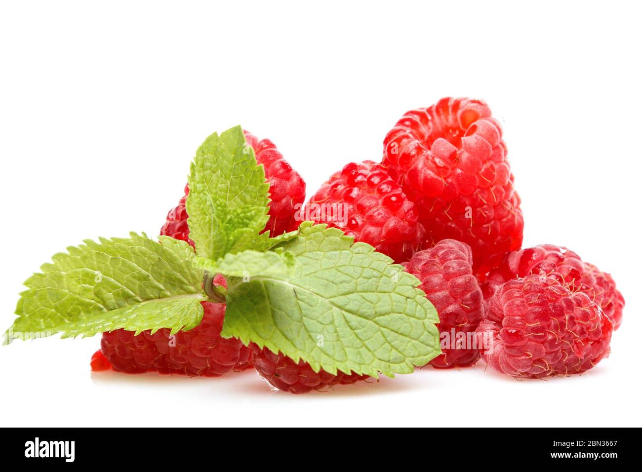 Fresh raspberries on white background Stock Photo - Alamy