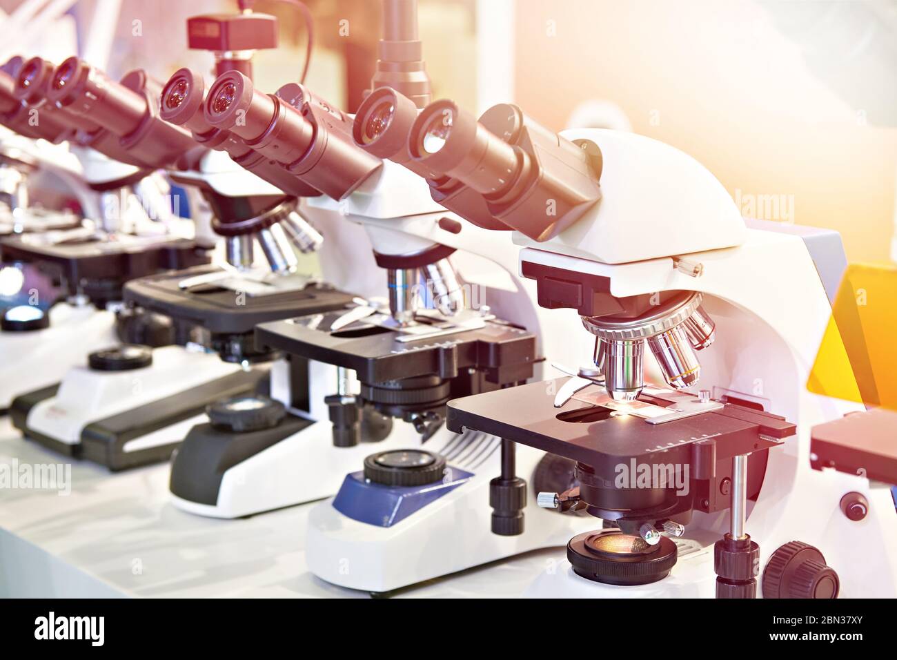 Optical microscopes in the store at the exhibition Stock Photo Alamy