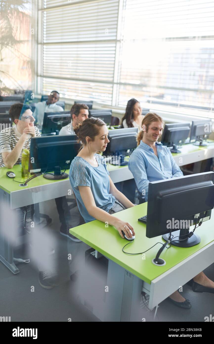 Students learn computer science in a university computer course Stock Photo