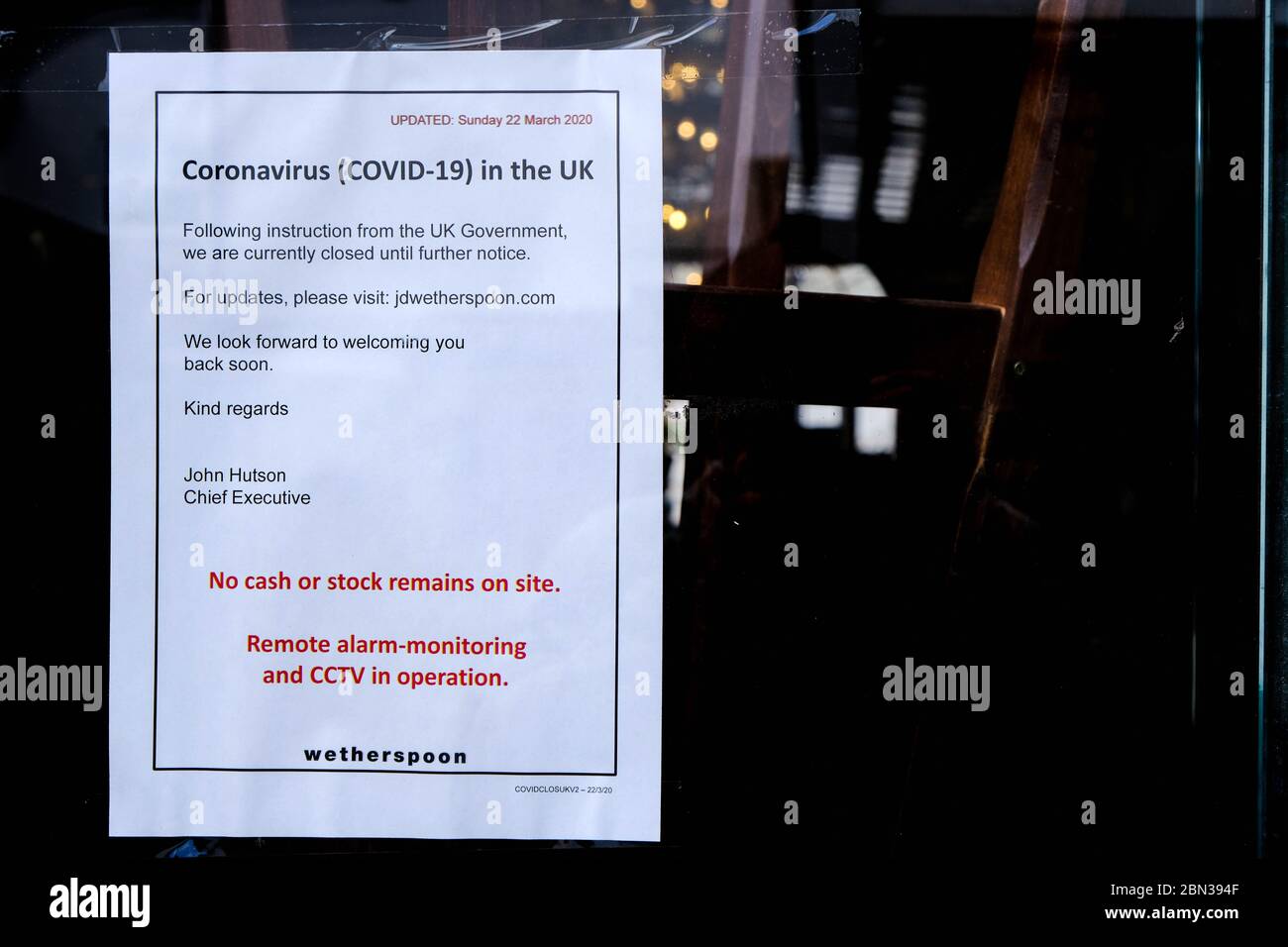 A Customer Advice Notice In The Window Of A Wetherspoons Pub During The Coronavirus Outbreak, South London 2020 Stock Photo