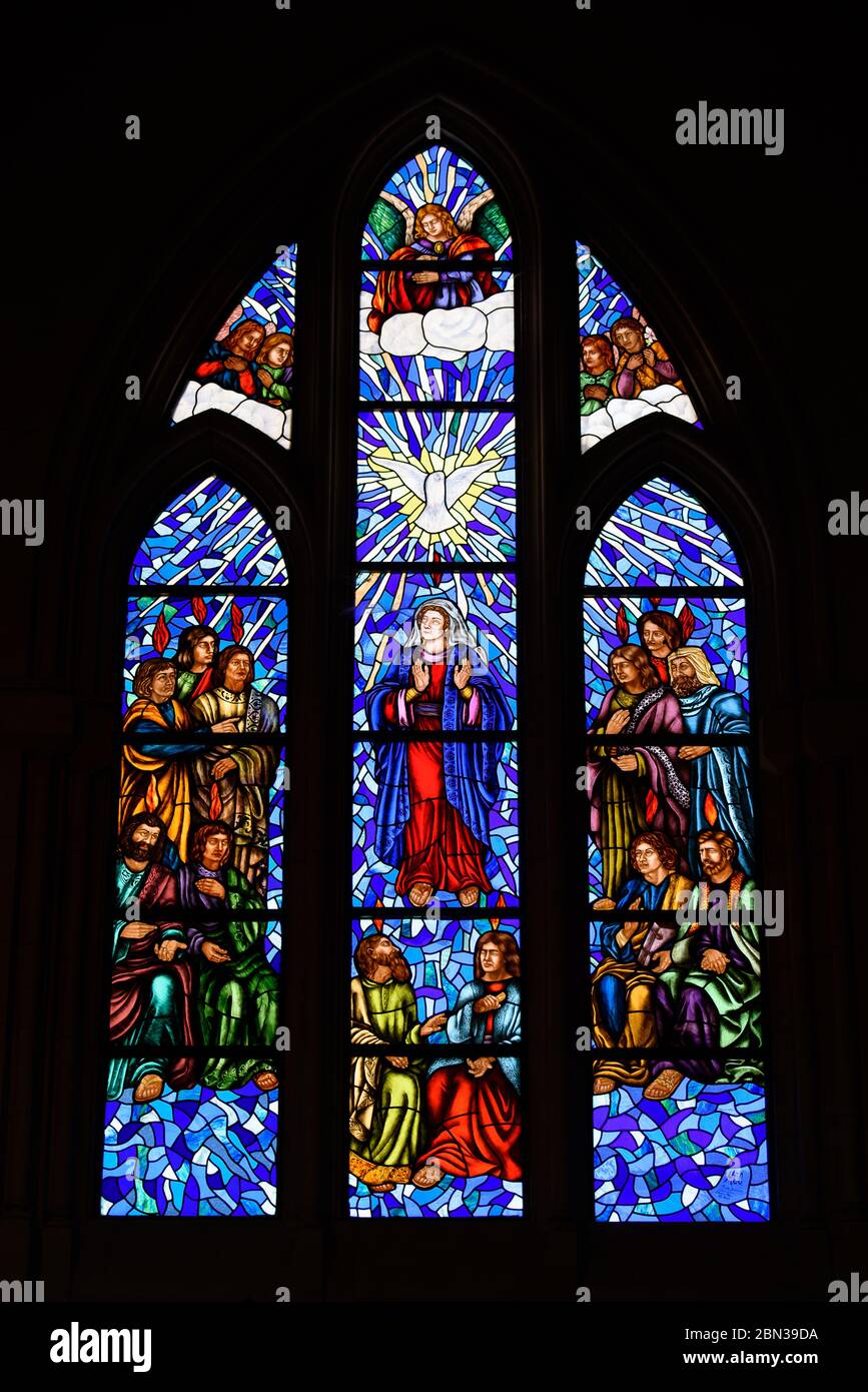 Stained glass window in Almudena Cathedral in Madrid, Spain Stock Photo