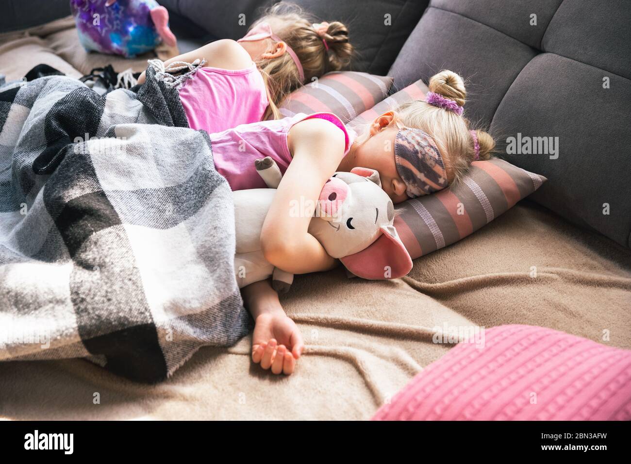 Quiet little girls sleeping in a bedroom in cute pajamas, home style ...