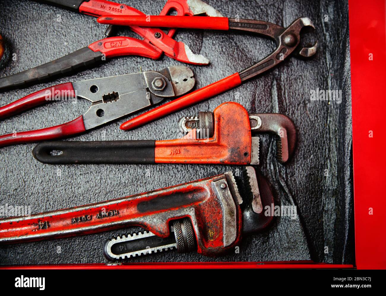 Red wrenches and pliers Stock Photo