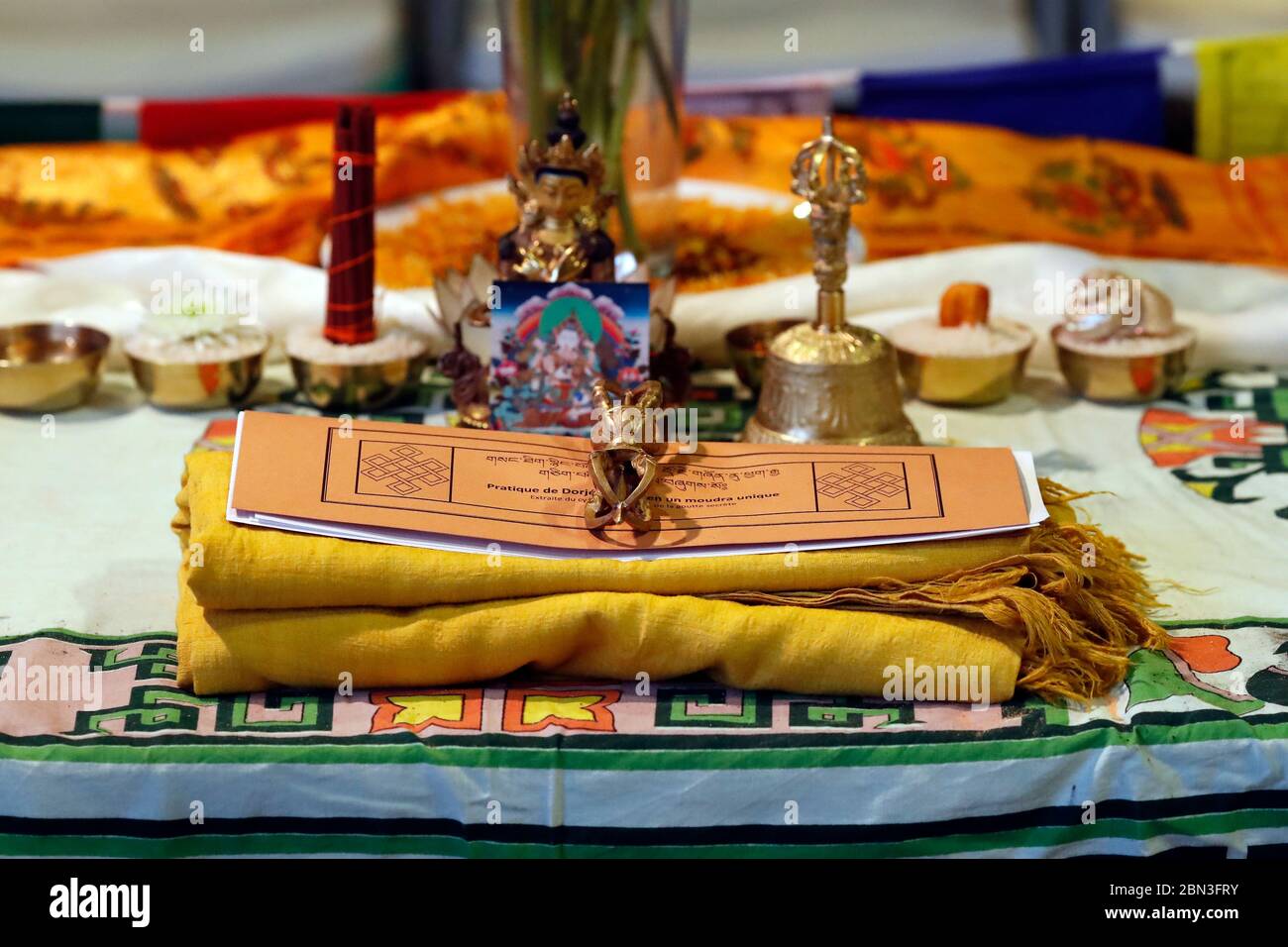 Vajra and Tibetan buddhist sacred texts. Sutra. France. Stock Photo