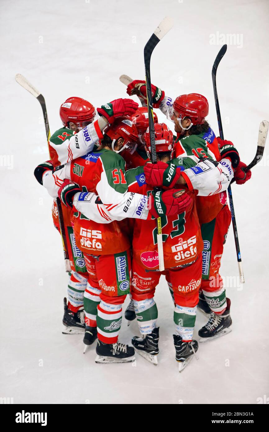 Ice Hockey match.  Hockey team. HC Mont-Blanc. Players celebrate a goal.  France. Stock Photo