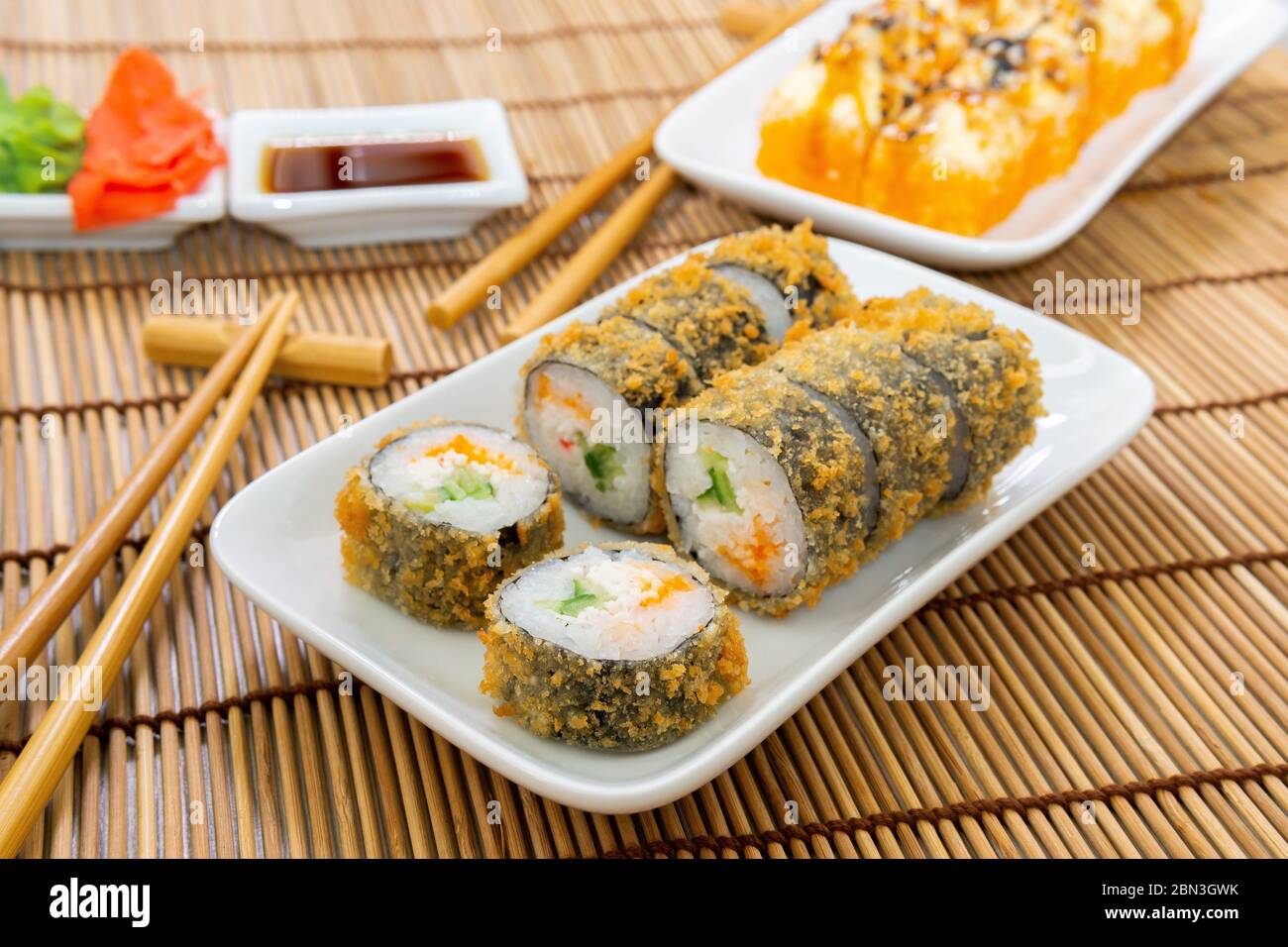 Baked Sushi Rolls Close Up Unagi And Flying Fish Roe Futomaki Asi Dish Of Japanese Cuisine Stock Photo Alamy