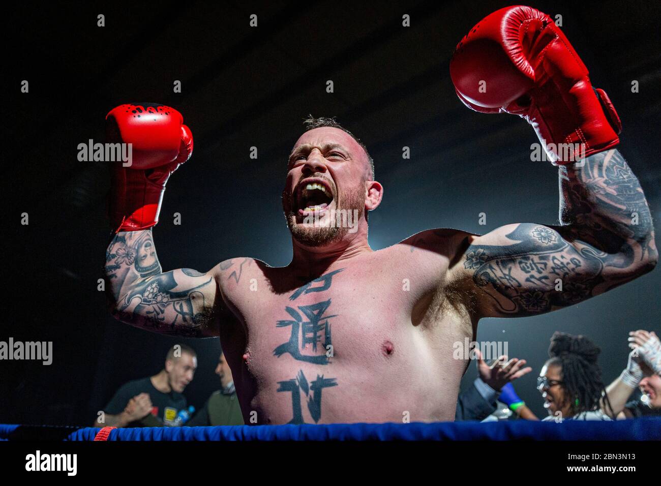 MANCHESTER, UK. 07 Dec 2018. Boxer Ian Butlin celebrates after a TKO in match 12 of KO Promotions Christmas Cracker boxing event at Bowlers Exhibition. Stock Photo