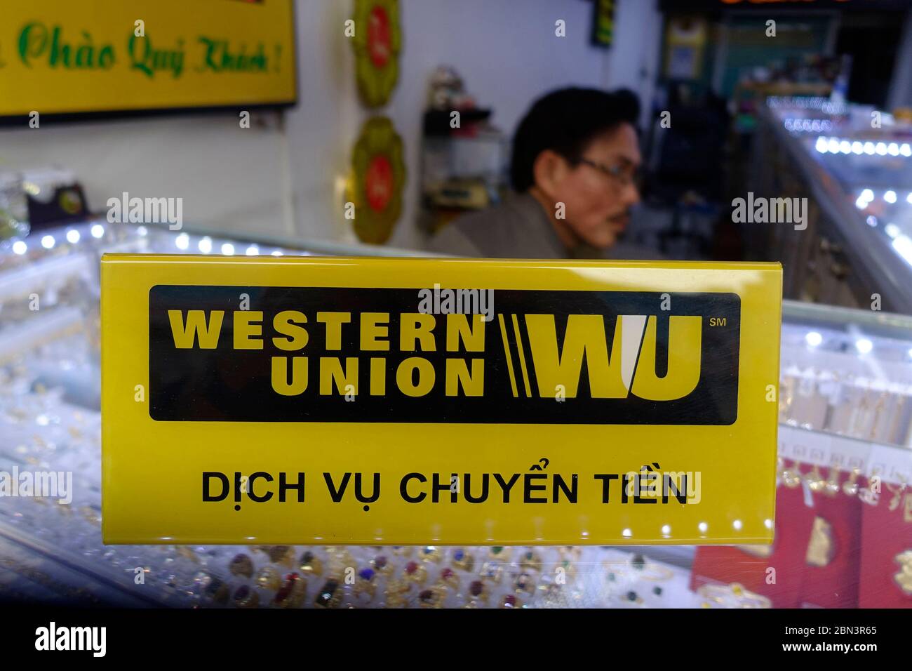 Money transfer. Western Union sign in a jewelery.  Ho Chi Minh City. Vietnam. Stock Photo