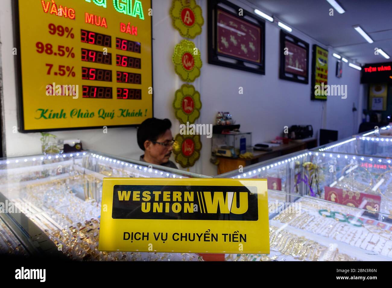 Money transfer. Western Union sign in a jewelery.  Ho Chi Minh City. Vietnam. Stock Photo