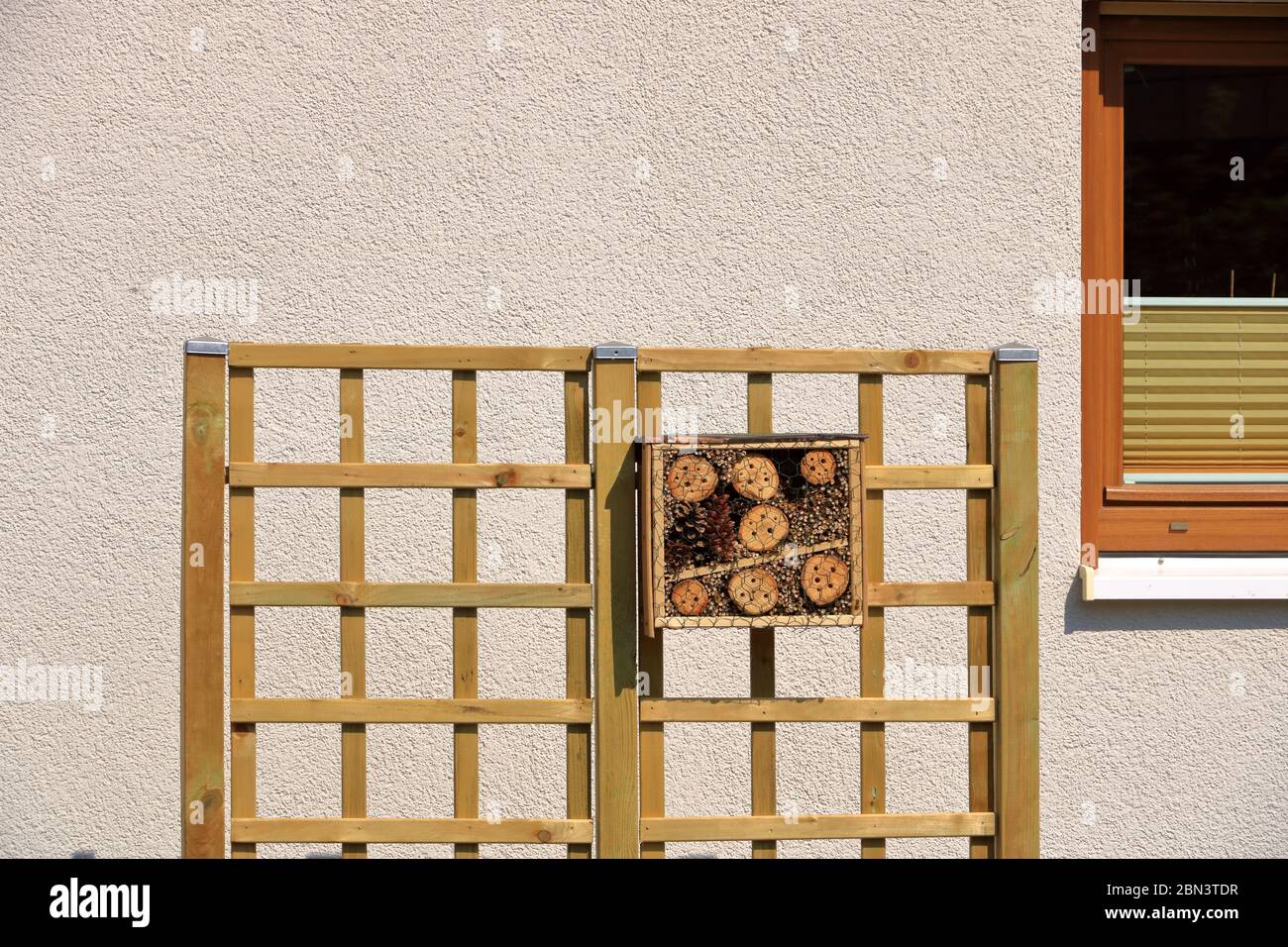 a wild bee and insect shelter hotel Stock Photo - Alamy