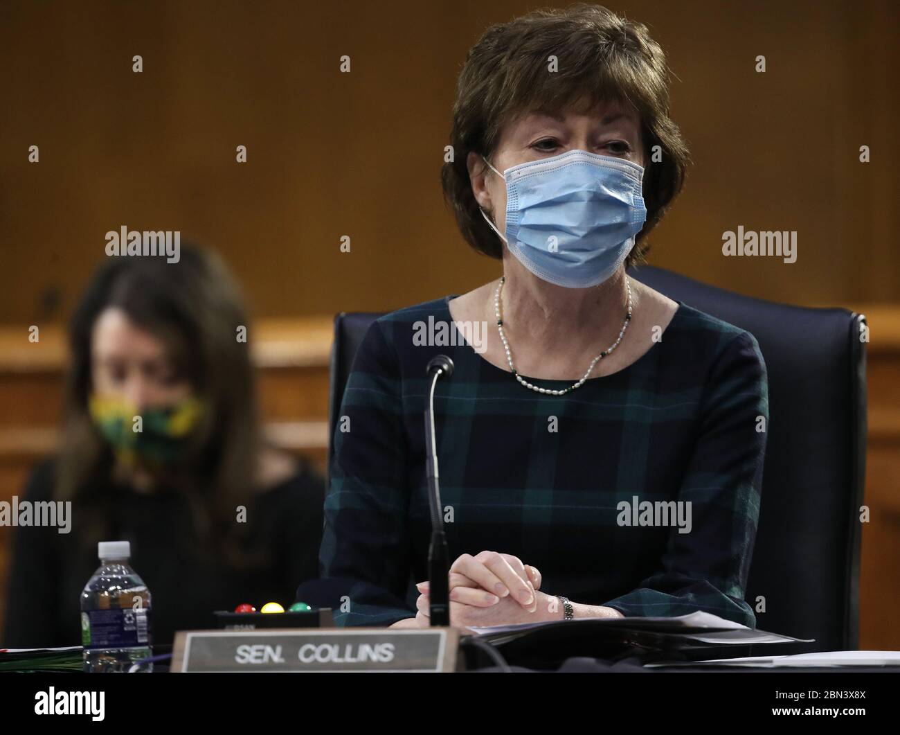 Washington, United States. 12th May, 2020. Sen. Susan Collins (R-ME) wears a mask while participating in a Senate Health, Education, Labor and Pensions Committee hearing on Capitol Hill on Tuesday, May 12, 2020 in Washington, DC. The committee is hearing testimony from members of the White House Coronavirus Task Force on how to safely reopen the country. Chairman Lamar Alexander and the witnesses are all in self-quarantine since they have been exposed to the virus. Stock Photo