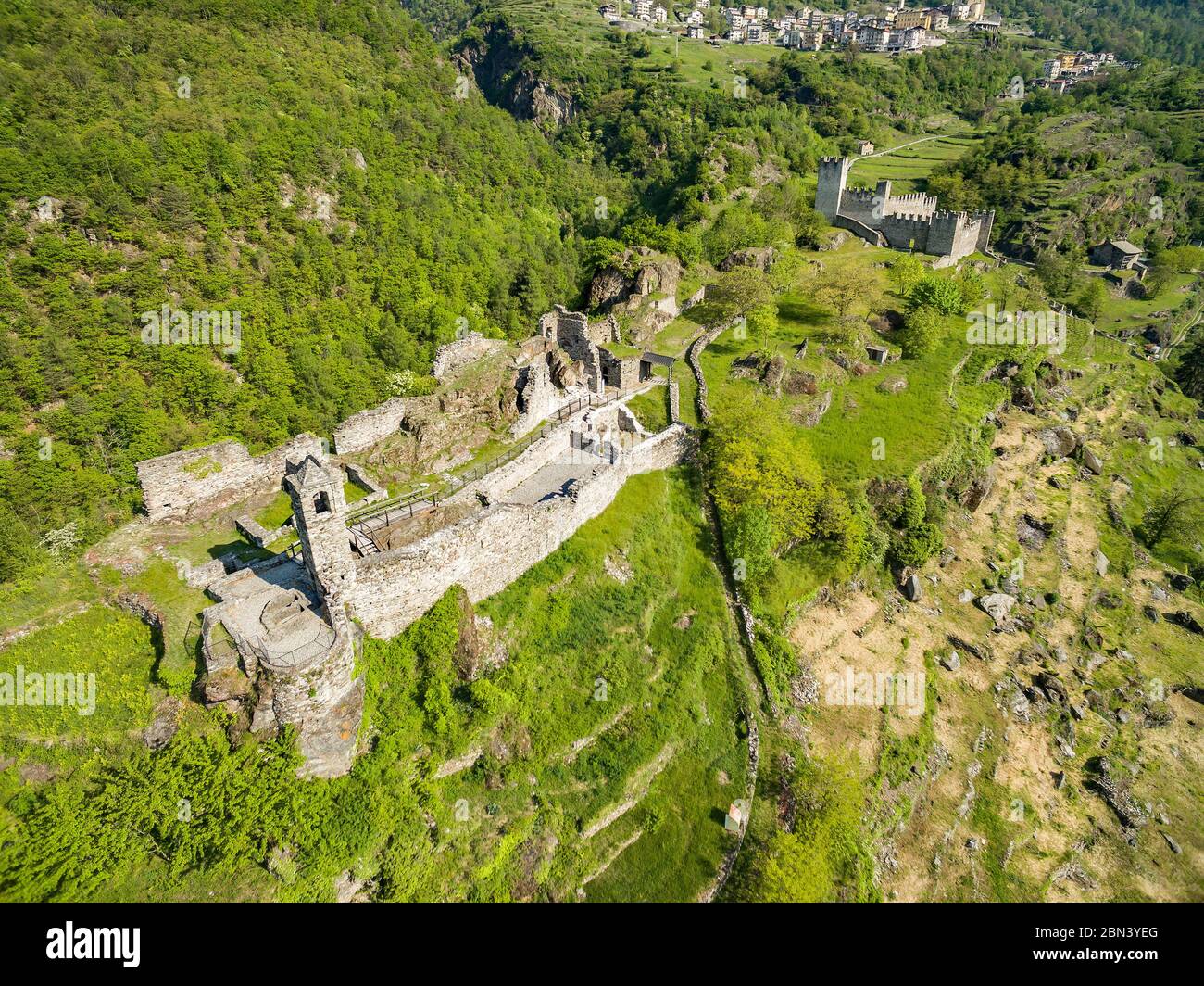 Grosio - Valtellina (IT) - New Castle and San Faustino - Park of Rupestrian incisions - aerial view Stock Photo