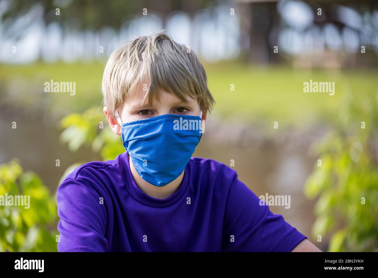 Person wearing a homemade face mask while in public, to prevent from getting sick during pandemic Stock Photo