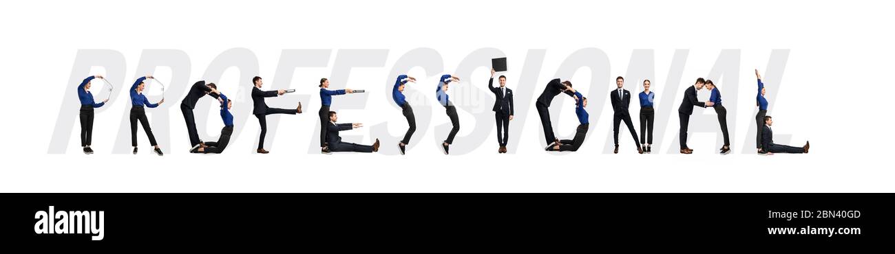 Group of people forming professional word at studio Stock Photo - Alamy