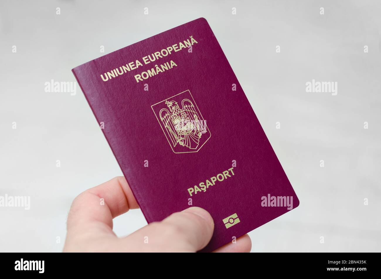 picture Romanian Passport Inside https www alamy com close up view of a romanian passport on a white background documents required to travel to countries around the world image357205455 html