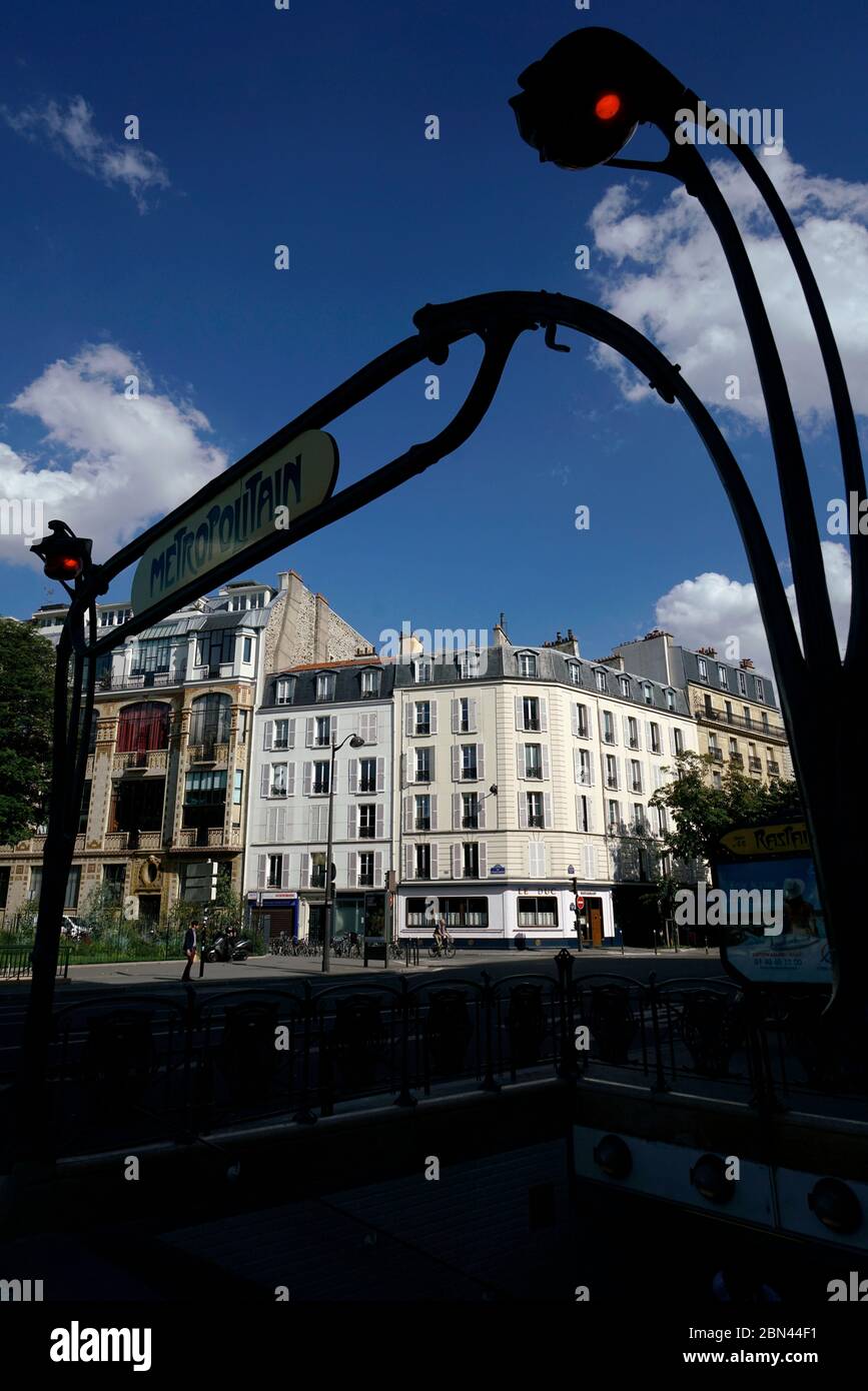 Art Nouveau cast iron entrance of Raspail station with sign of Metropolitan designed by Hector Guimard in Montparnasse.Paris.France Stock Photo