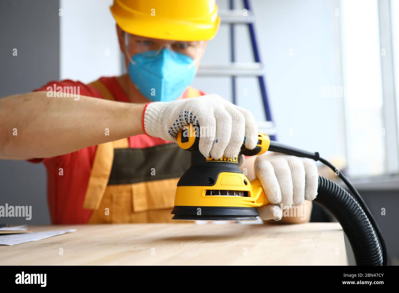 Concentrated man in face mask Stock Photo