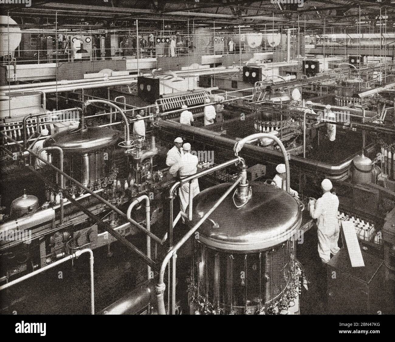 Dairy Industry in Britain - A circa 1930's photograph of the UK Express Dairies milk bottling plant. Stock Photo